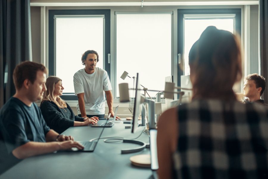 Team meeting to plan content strategy in an office
