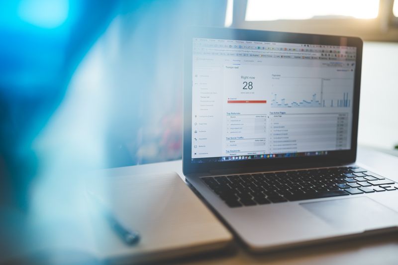 Laptop showing a live audience analytics dashboard